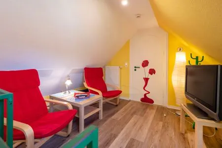 Aufenthaltsbereich DG Ferienpark Freesenbruch Wohnung 1.5 - Amber