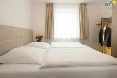 Schlafzimmer Haus Nordland Ferienwohnung Wattblick 1