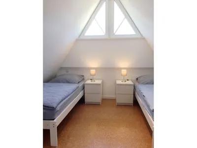 Schlafzimmer mit zwei Einzelbetten  Rosenberg-Siedlung 21a/2