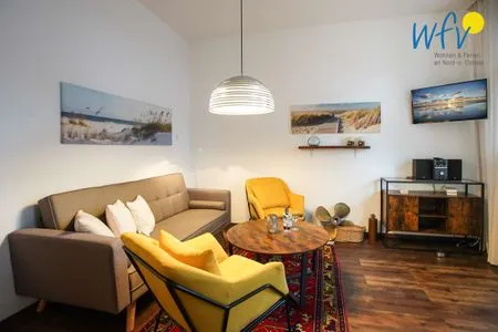 Wohnzimmer Kirchstr. 11 Borkum Ferienwohnung Bollstove