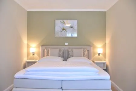 Schlafzimmer mit Doppelbett Logierhaus Friedrich WE 5 - "Ostseewelle"