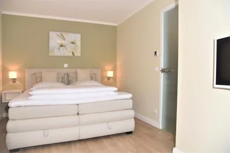 Schlafzimmer mit Doppelbett Logierhaus Friedrich WE 5 - "Ostseewelle"