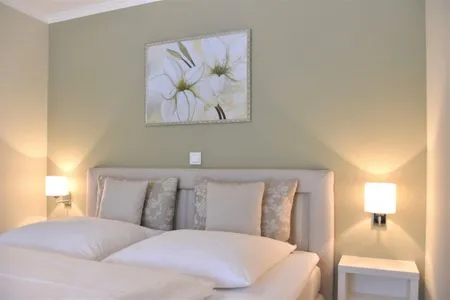 Schlafzimmer mit Doppelbett Logierhaus Friedrich WE 5 - "Ostseewelle"