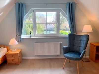 Schlafzimmer mit zwei Einzelbetten  Strandhaus Pilgrim