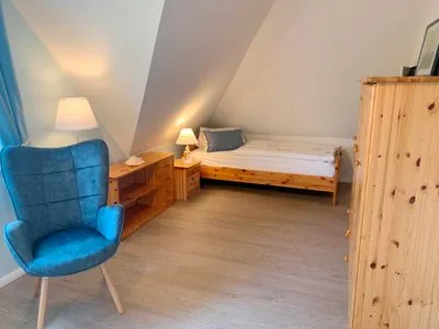 Schlafzimmer mit zwei Einzelbetten  Strandhaus Pilgrim