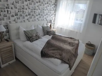 Schlafzimmer mit Doppelbett Residenz am Strand Wohnung 2-36