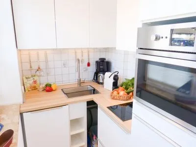 Küche in der Ferienwohnung Reethuk in Norddorf auf Amrum Haus Pesel Ferienwohnung *Reethuk*
