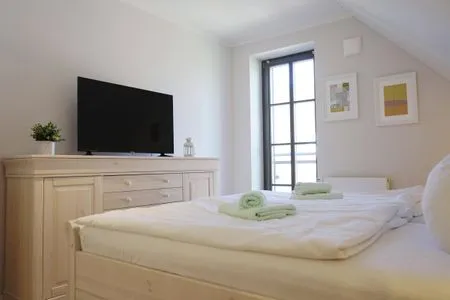 Schlafzimmer mit Doppelbett  Strandperle - Anlage Heiderose