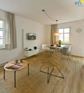 Wohnzimmer Haus am Dorfbrunnen Ferienwohnung Muschel