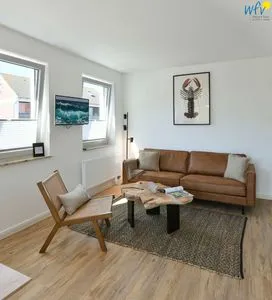 Wohnzimmer Haus am Dorfbrunnen Ferienwohnung Möwe