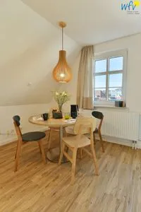 Wohnzimmer Haus am Dorfbrunnen Ferienwohnung Meer