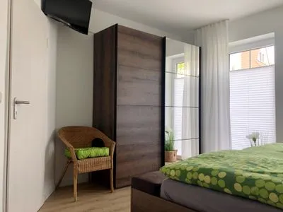 Schlafzimmer mit Doppelbett Parkresidenz am Hafen Wohnung HF 11 - "MeerZeit"