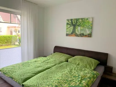 Schlafzimmer mit Doppelbett Parkresidenz am Hafen Wohnung HF 11 - "MeerZeit"