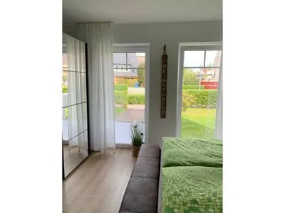 Schlafzimmer mit Doppelbett Parkresidenz am Hafen Wohnung HF 11 - "MeerZeit"