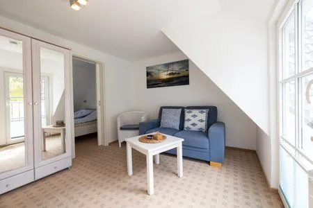 Wohnzimmer Haus Waltraud Ferienwohnung „Spelkasje"