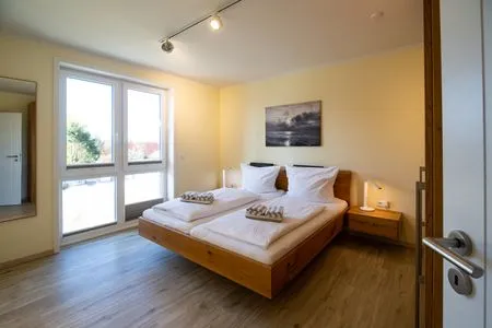 Schlafzimmer Haus *Weiße Düne* Ferienwohnung *Weiße Düne 5*