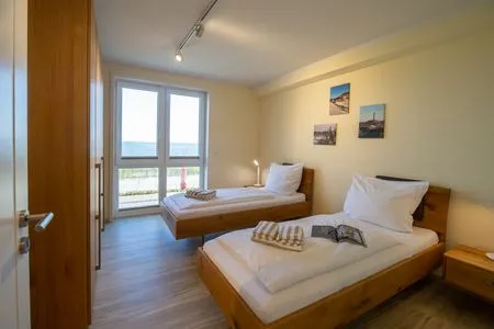 Schlafzimmer Haus *Weiße Düne* Ferienwohnung *Weiße Düne 6*