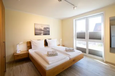 Schlafzimmer Haus *Weiße Düne* Ferienwohnung *Weiße Düne 6*