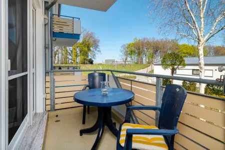 Balkon mit Tisch und Bestuhlung Residenz am Strand Wohnung 2-28