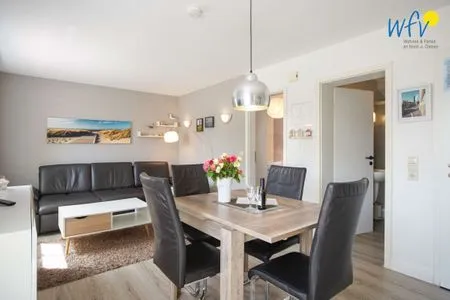 Wohnzimmer Hus Strandloperke Ferienwohnung 5
