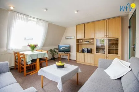 Wohnzimmer Haus Bonhuis Ferienwohnung Leuchtturmblick