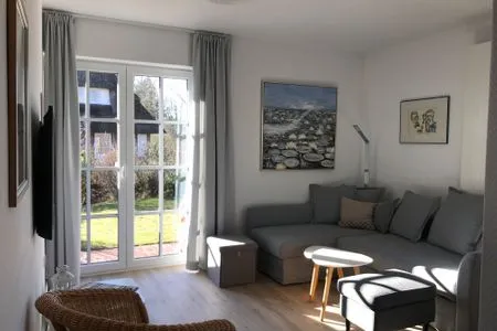 Wohnzimmer der Ferienwohnung Reethuk in Norddorf auf Amrum Haus Pesel Ferienwohnung *Reethuk*