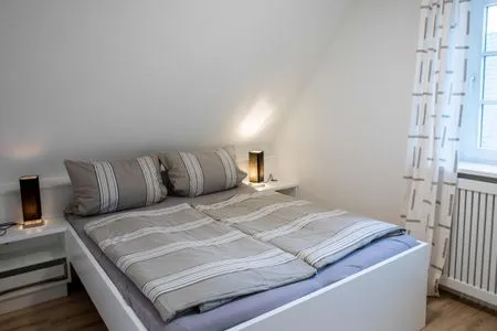 Schlafzimmer Ferienwohnung Wrixumer Marsch