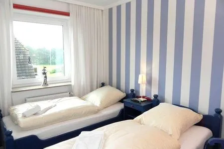 Schlafzimmer in der Ferienwohnung Jessen´s Wattblick in Wittdün auf Amrum Ferienwohnung *Jessen´s Wattblick*