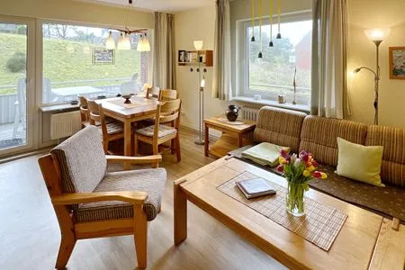 Wohn- und Esszimmer der Ferienwohnung Kreft in Wittdün auf Amrum Haus Seeadler Ferienwohnung *Kreft*