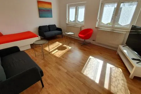 Wohnzimmer Ferienwohnung "Amperschlucht"