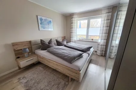 Schlafzimmer mit Doppelbett Hoppenberg 5 - Wohnung Schröder