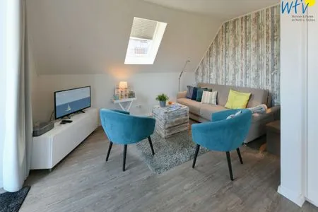 Wohnzimmer Bootshaus in den Dünen - 4 Ferienwohnung Dünenkoje