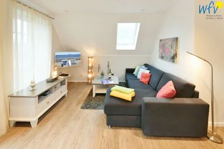 Wohnzimmer Bootshaus in den Dünen - 4 Ferienwohnung Sonnendeck