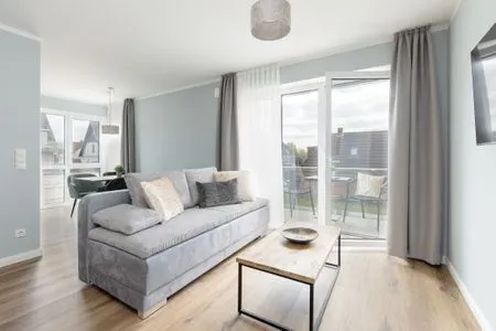 Wohnzimmer Sturmfrei Ferienwohnung "Suite 6"