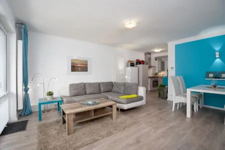 Wohnzimmer (MEI2b) Ferienwohnung "Landkrabbe"