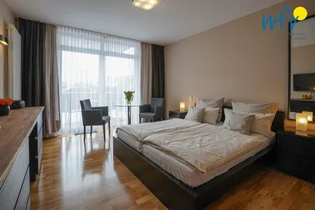 Wohnzimmer Barons Residenz Ferienwohnung 1