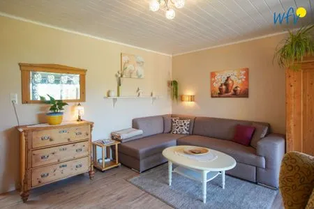 Wohnzimmer Ferienhaus Heidi Häuschen Seehund