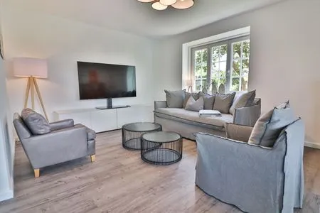 Wohnzimmer Haus Dünenblume - Wohnung 1