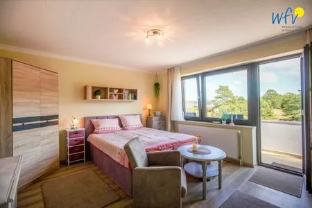 Schlafzimmer Ferienhaus Heidi Appartement Muschel