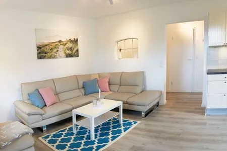 Wohnzimmer Ferienwohnung Seegras - mit SPIELSCHEUNE, direkt am Wittensee
