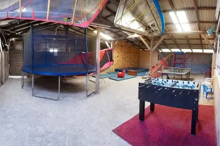 Spielanlage Ferienwohnung „Waterkant“ am Wittensee – viel Platz, Garten und Spielscheune