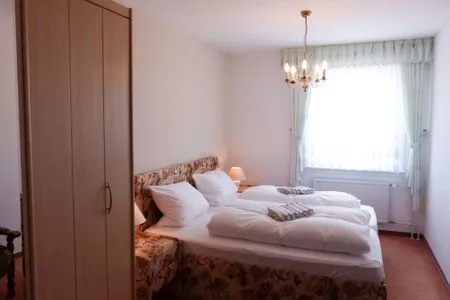 Schlafzimmer Haus Nordenlicht Ferienwohnung „Naujokat"