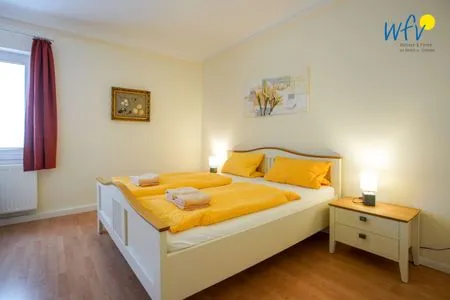 Schlafzimmer Ferienhaus Tuffel Ferienwohnung 1