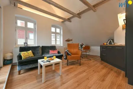 Wohnzimmer Logirhaus Doyen Ferienwohnung 9