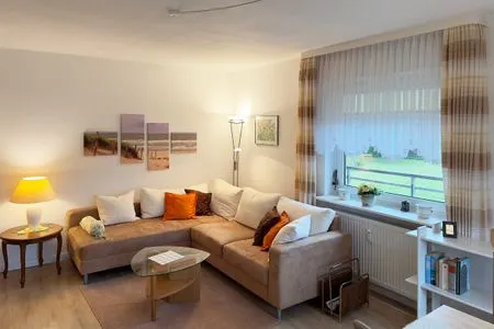 Wohnzimmer der Ferienwohnung Meeresbrise in Wittdün auf Amrum Haus Seeadler Ferienwohnung Meeresbrise