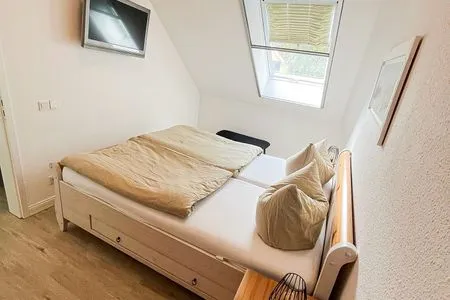 Schlafzimmer mit Doppelbett Residenz am Strand Wohnung 1-21