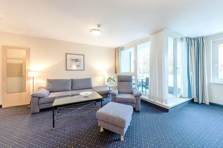 Ferienwohnung Deichblick Aparthotel Zingst - Wohnzimmer  Deichblick