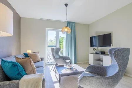 Ferienwohnung Achterndieck Ostseebad Wustrow - ZweiWasser Alte Seefahrtschule Wohnzimmer  Achterndieck