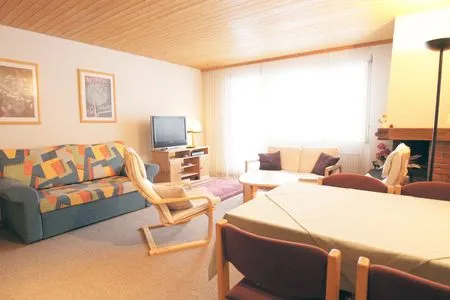 Living room with dining table Apartment Kaiser
