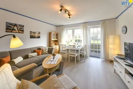 Wohnzimmer Familienhaus im Dorfgroden 27 Ferienwohnung kleiner Kompass